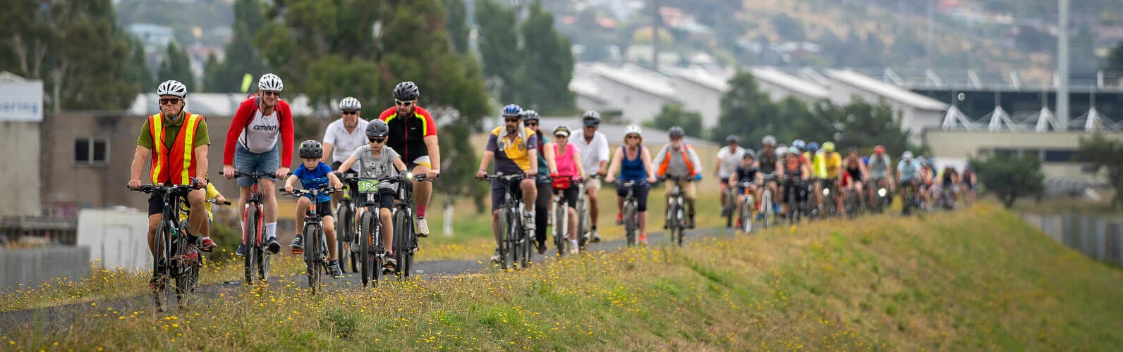 People riding on the levy bank