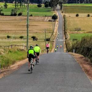 People cycling in the countryside.